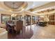 Elegant kitchen with an island, custom cabinetry, and breakfast area at 14705 E Redbird Rd, Scottsdale, AZ 85262