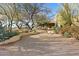 Landscaped yard with gravel path leading to the house at 14705 E Redbird Rd, Scottsdale, AZ 85262