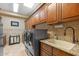 Bright laundry room with washer, dryer, and ample cabinetry at 14705 E Redbird Rd, Scottsdale, AZ 85262