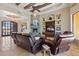 Living room features a stone fireplace and built-in entertainment center at 14705 E Redbird Rd, Scottsdale, AZ 85262