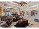 Open living area with leather seating and views into other rooms at 14705 E Redbird Rd, Scottsdale, AZ 85262