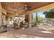 Relaxing patio with fireplace and seating area, perfect for outdoor entertaining at 14705 E Redbird Rd, Scottsdale, AZ 85262