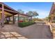Covered patio with pergola and seating area at 14705 E Redbird Rd, Scottsdale, AZ 85262
