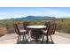 Rooftop deck with mountain views and fire pit table for four at 14705 E Redbird Rd, Scottsdale, AZ 85262