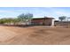 Covered tack room with ample storage space at 14705 E Redbird Rd, Scottsdale, AZ 85262
