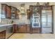 Kitchen features stainless steel appliances and dark wood cabinetry at 14944 E Zapata Dr, Fountain Hills, AZ 85268