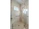 Walk-in shower with built-in seat and neutral tile at 14944 E Zapata Dr, Fountain Hills, AZ 85268