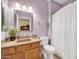 Clean bathroom with a single sink vanity and a shower/tub combo at 15827 W Falcon Ridge Dr, Sun City West, AZ 85375