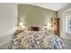 Spacious bedroom with king-size bed and ample natural light at 15827 W Falcon Ridge Dr, Sun City West, AZ 85375