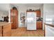 Kitchen with wood cabinets, granite counters, and island at 15827 W Falcon Ridge Dr, Sun City West, AZ 85375