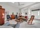 Living room with comfortable seating, a coffee table, and a rocking chair at 15827 W Falcon Ridge Dr, Sun City West, AZ 85375