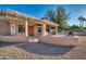 Covered patio with seating area, offering an outdoor space for relaxation and entertainment at 15827 W Falcon Ridge Dr, Sun City West, AZ 85375
