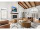 Bright living room with fireplace and large windows at 1739 E Flynn Ln, Phoenix, AZ 85016