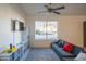 Bright living room featuring a comfy couch and large window at 17422 N 1St Dr, Phoenix, AZ 85023