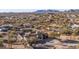 Aerial view of house and surrounding desert landscape at 2070 N Don Peralta Rd, Apache Junction, AZ 85119