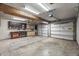 Spacious garage with built-in workbench and storage at 2070 N Don Peralta Rd, Apache Junction, AZ 85119