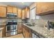 Kitchen with stainless steel appliances and granite countertops at 2070 N Don Peralta Rd, Apache Junction, AZ 85119