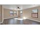 Spacious bedroom with wood floors and multiple windows at 219 E Beth Dr, Phoenix, AZ 85042