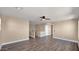 Large bedroom with wood floors and access to hallway at 219 E Beth Dr, Phoenix, AZ 85042