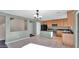 Kitchen features wood cabinets, granite counters, and island at 219 E Beth Dr, Phoenix, AZ 85042
