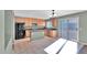 Modern kitchen with wood cabinets and granite countertops at 219 E Beth Dr, Phoenix, AZ 85042