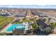 Aerial view of community pool, clubhouse and playground at 22846 E Watford Dr, Queen Creek, AZ 85142