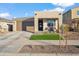 New modern home with landscaped front yard and two-car garage at 22846 E Watford Dr, Queen Creek, AZ 85142