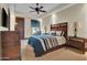 Comfortable bedroom with a double bed and wooden dresser at 2333 S Eileen Pl, Chandler, AZ 85286
