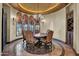 Elegant dining room featuring a round table and ornate chairs at 2333 S Eileen Pl, Chandler, AZ 85286