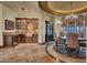 Formal dining room with a charming chandelier and large windows at 2333 S Eileen Pl, Chandler, AZ 85286