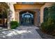 Elegant entryway with a large iron door and stone accents at 2333 S Eileen Pl, Chandler, AZ 85286