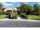 Exterior view of a luxury home with a walkway to the entrance at 2333 S Eileen Pl, Chandler, AZ 85286