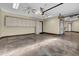 Large garage with ample storage cabinets and a finished floor at 2333 S Eileen Pl, Chandler, AZ 85286