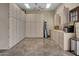 Well-organized garage with built-in cabinets and workspace at 2333 S Eileen Pl, Chandler, AZ 85286