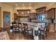 Gourmet kitchen with large island, granite counters, and custom cabinetry at 2333 S Eileen Pl, Chandler, AZ 85286