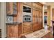 Luxury kitchen with built-in appliances and granite countertops at 2333 S Eileen Pl, Chandler, AZ 85286