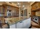 Large kitchen island with granite countertop and stainless steel appliances at 2333 S Eileen Pl, Chandler, AZ 85286
