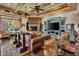 Spacious living room featuring a stone fireplace and hardwood floors at 2333 S Eileen Pl, Chandler, AZ 85286