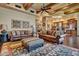 Open living space with leather sofas and a view into the kitchen at 2333 S Eileen Pl, Chandler, AZ 85286