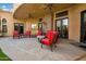 Covered patio with comfortable seating and ceiling fans at 2333 S Eileen Pl, Chandler, AZ 85286