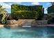 Refreshing pool with a unique water feature and stone accents at 2333 S Eileen Pl, Chandler, AZ 85286