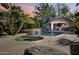 Luxury backyard oasis with a pool, spa, and outdoor kitchen at 2333 S Eileen Pl, Chandler, AZ 85286
