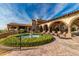 Community courtyard with fountain, seating area, and scenic views at 31023 N 117Th Dr, Peoria, AZ 85383