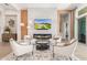 Cozy living room featuring a modern fireplace and stylish decor at 31023 N 117Th Dr, Peoria, AZ 85383
