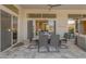 Covered patio with dining table at 31023 N 117Th Dr, Peoria, AZ 85383
