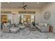 Inviting covered patio with comfortable seating at 31023 N 117Th Dr, Peoria, AZ 85383