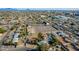 Aerial photograph showing home, neighborhood, and distant city skyline at 3601 W Solano Dr, Phoenix, AZ 85019