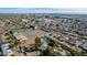 Aerial photograph showing home, neighborhood, and distant city skyline at 3601 W Solano Dr, Phoenix, AZ 85019
