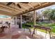 Covered patio with outdoor seating and grill at 3601 W Solano Dr, Phoenix, AZ 85019