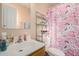 Bathroom with shower and a floral shower curtain at 3601 W Solano Dr, Phoenix, AZ 85019